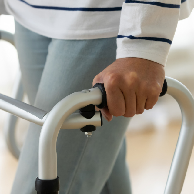 Man with walking frame